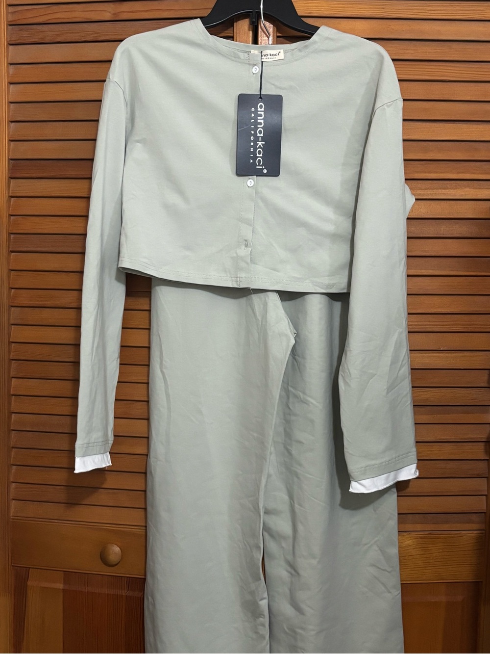 cropped long-sleeve top and matching wide-leg bottoms.